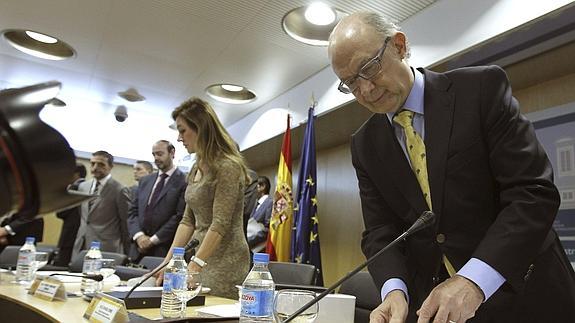 El ministro de Hacienda, Cristóbal Montoro, antes de la reunión.