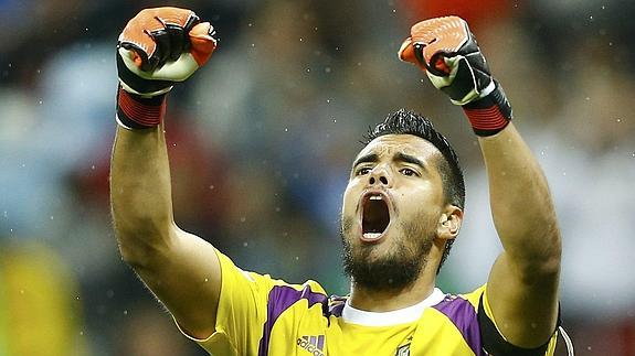 Romero, tras parar un penalti. 