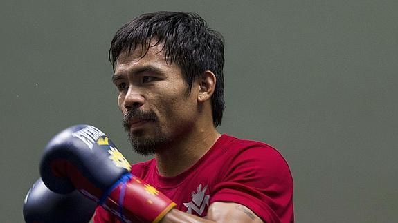 Pacquiao, a la espera de que Mayweather se decida