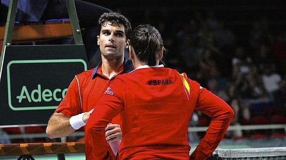 Andújar y Conchita Martínez, durante el partido ante Rublev. 