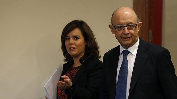 Soraya Sáenz de Santamaría y Cristóbal Montoro.