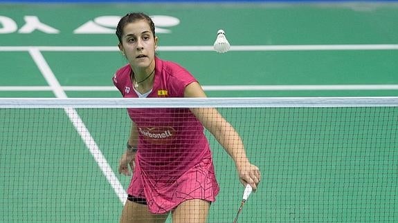 Marín devuelve la pelota durante un partido. 