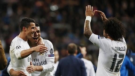 Cristiano, Casemiro y Marcelo celebran la clasificación ante el Wolfsburgo. 