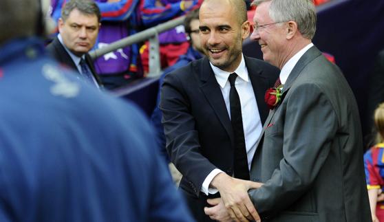 Guardiola y Ferguson, durante un partido. 