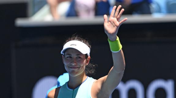 Garbiñe Muguruza celebra la victoria. 