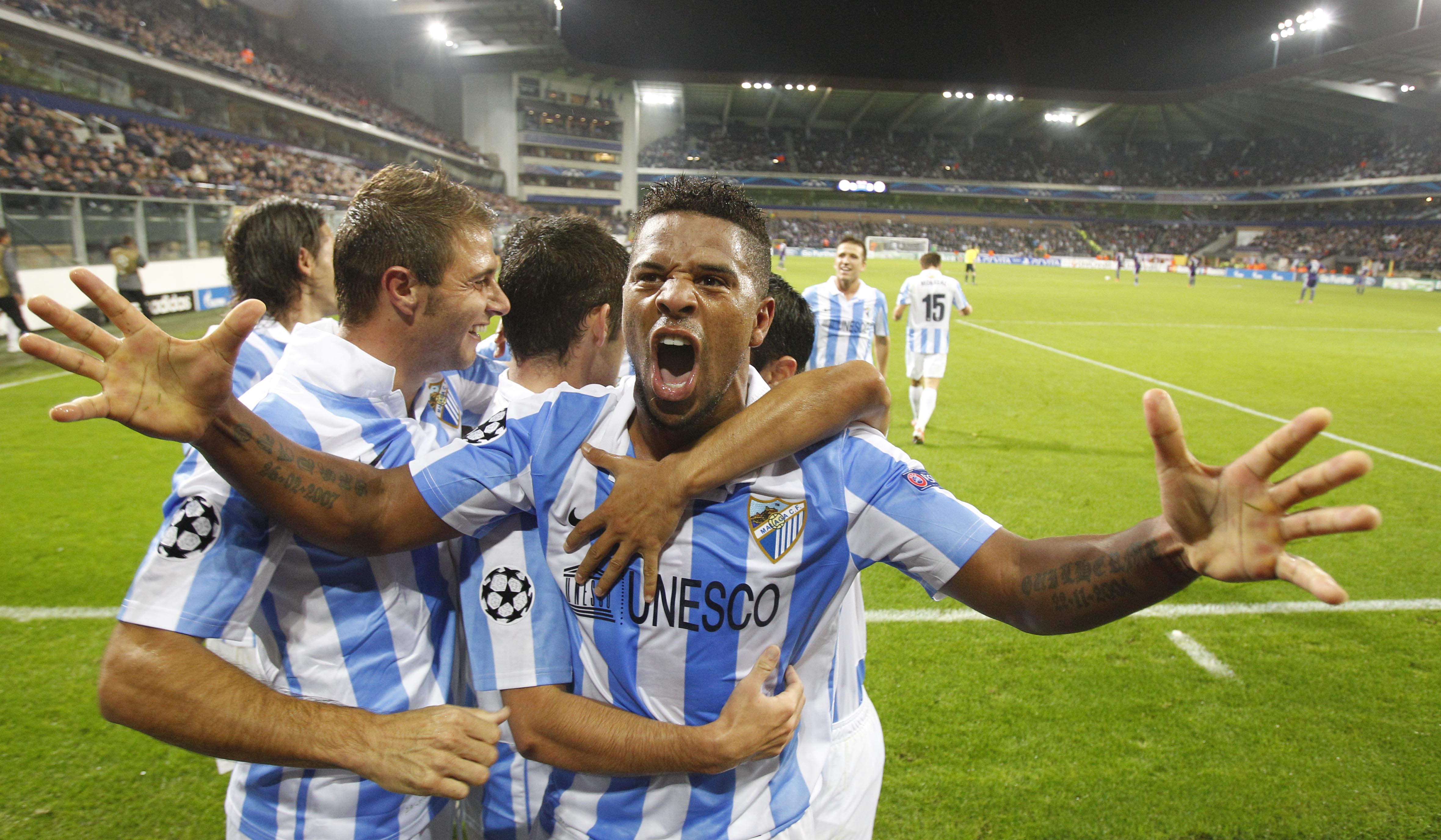 Eliseu celebra uno de los dos golazos que le marcó al Anderlecht en Bruselas.