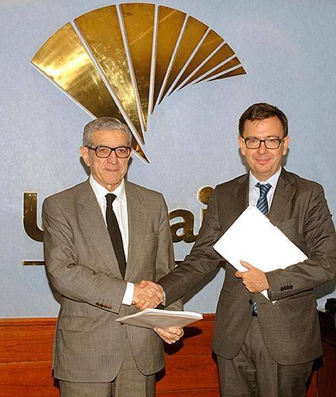 El Presidente de Unicaja Banco, Braulio Medel, y el Vicepresidente del BEI, Román Escolano.