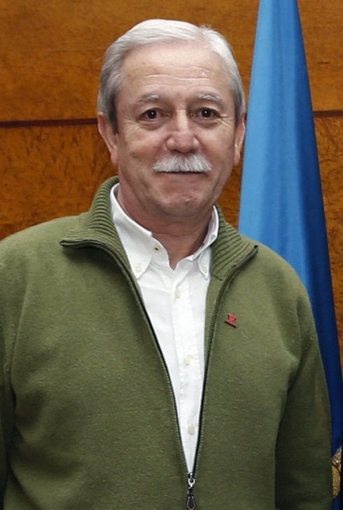 Abajo, registro policial. Arriba, Justo Rodríguez. :: efe
