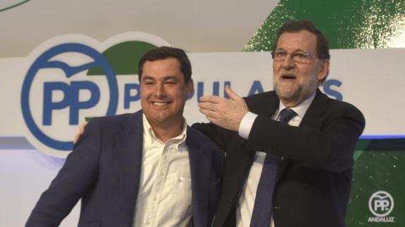 Rajoy apoyando a Moreno. 