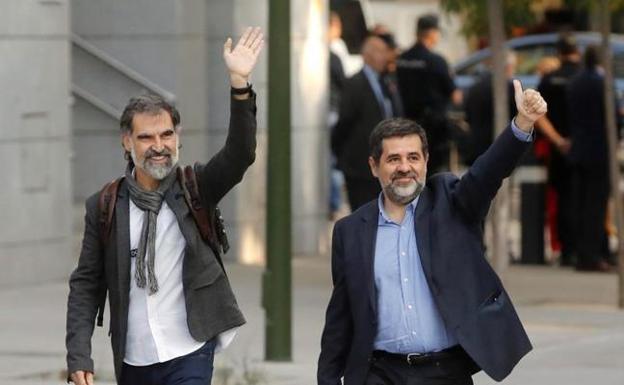 Jordi Cuixart y Jordi Sánchez,a su llegada a la Audiencia Nacional. 