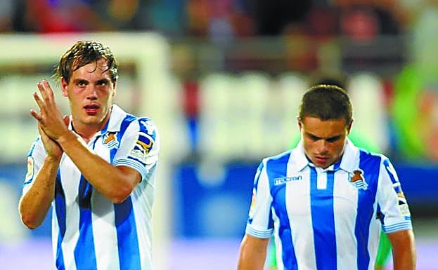 Bautista y el debutante Sangalli, con cara de circunstancias tras la derrota. 