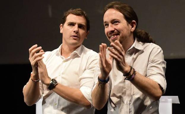 Albet Rivera (i) y Pablo Iglesias. 