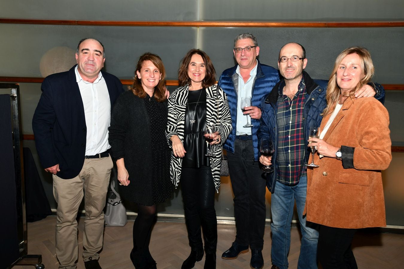 Invitados del mundo de la política, deportistas, comunicadores, patrocinadores y colaboradores posan en el photocall previo al Concierto de Navidad y en el cóctel posterior al evento