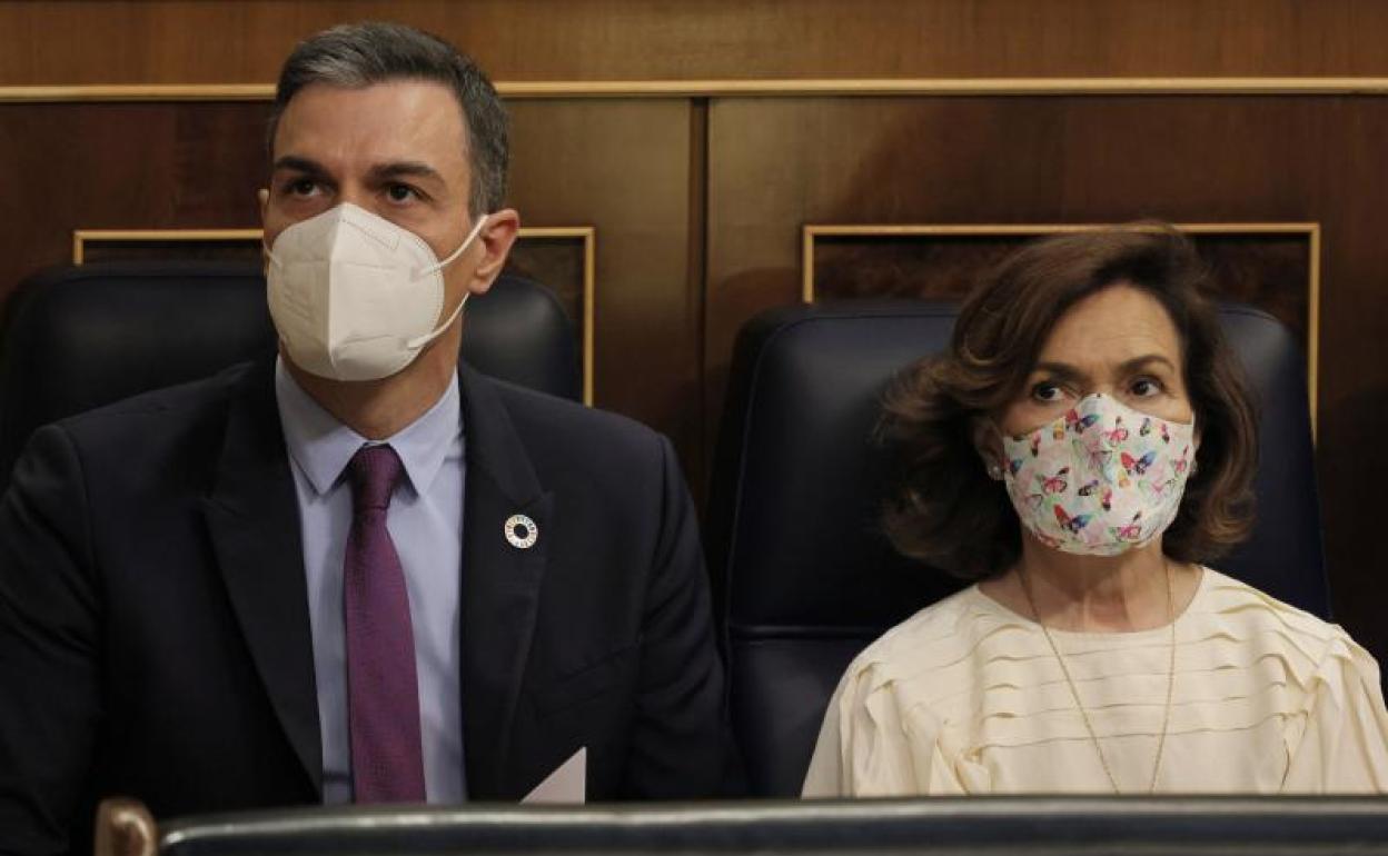 Pedro Sánchez y Nadia Calviño. 