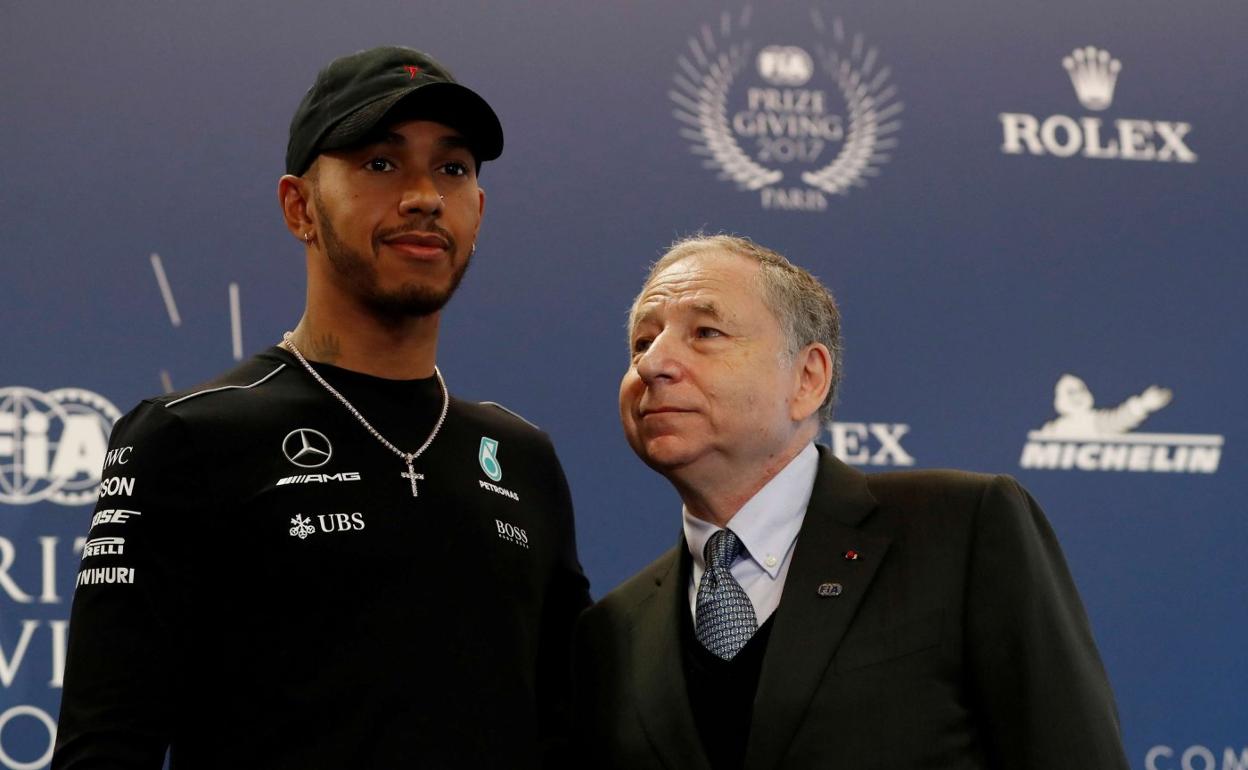 Hamilton con Todt, con quien la relación es tirante en los últimos tiempos. 