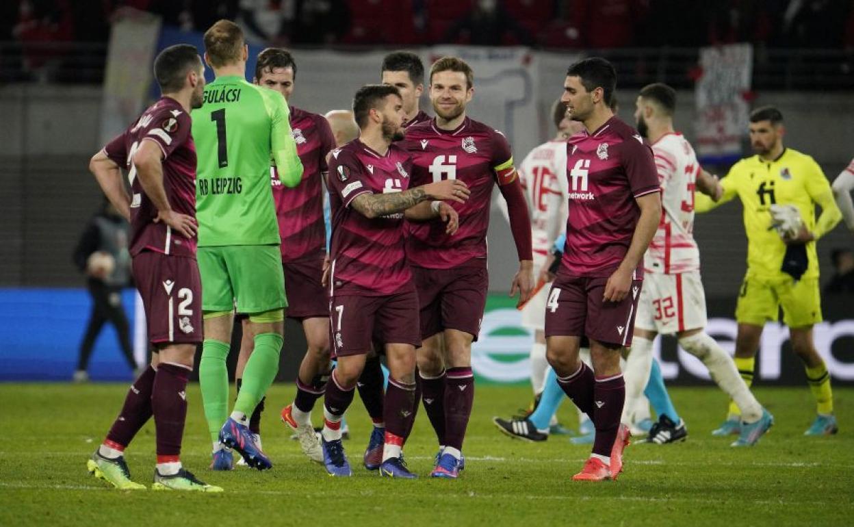 Asier Illarramendi, sonriente, junto a Portu y Ander Martín.