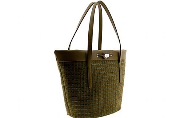 Bolso capazo Hope en verde de Box San Sebastián.