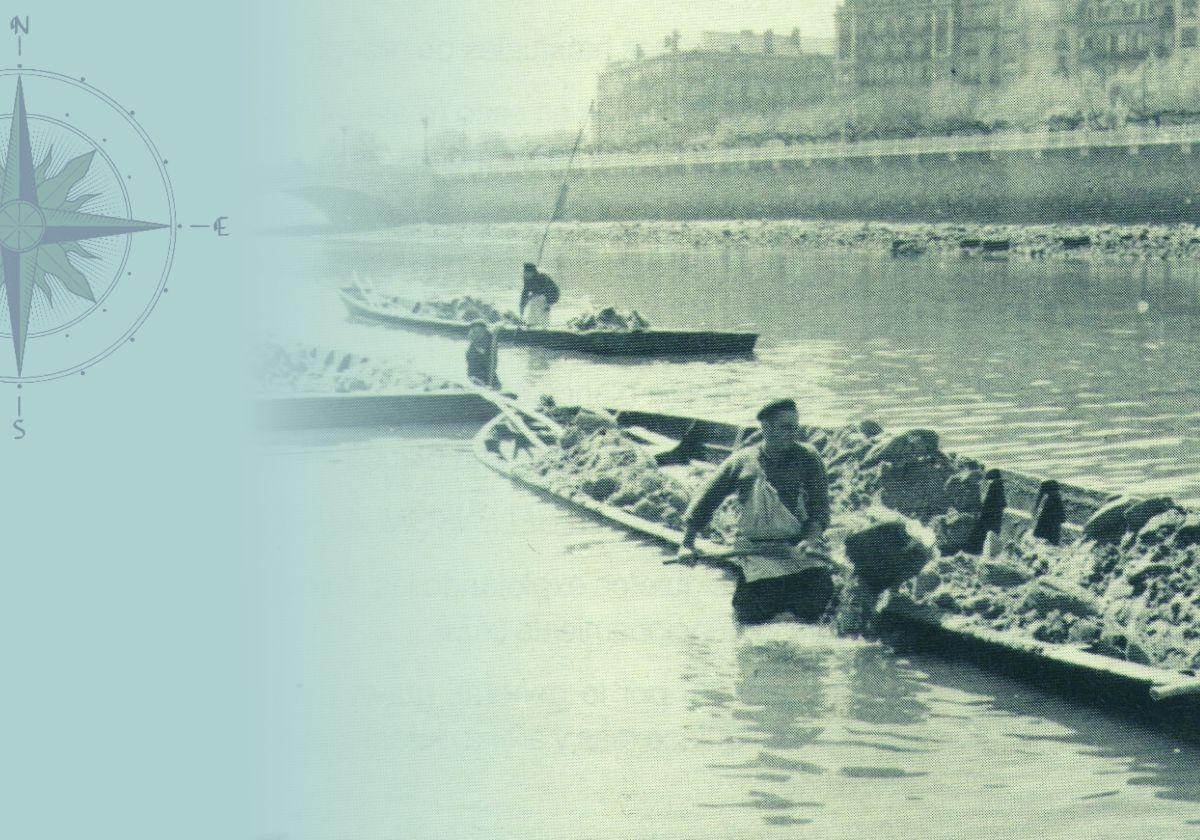 El arenero Joaquín San Sebastián, del caserío Benartegui de Martutene, en plena faena en el 'txoko' del Urumea (1961).