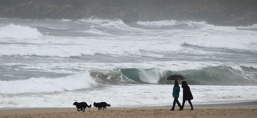Fotos: Jornada gris y lluviosa