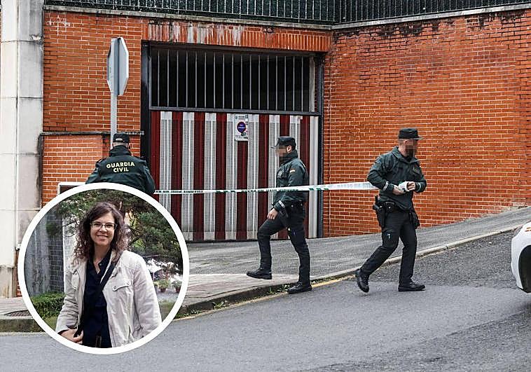 Agentes precintando la entrada al garaje donde apareció el cadáver de Silvia L. G.