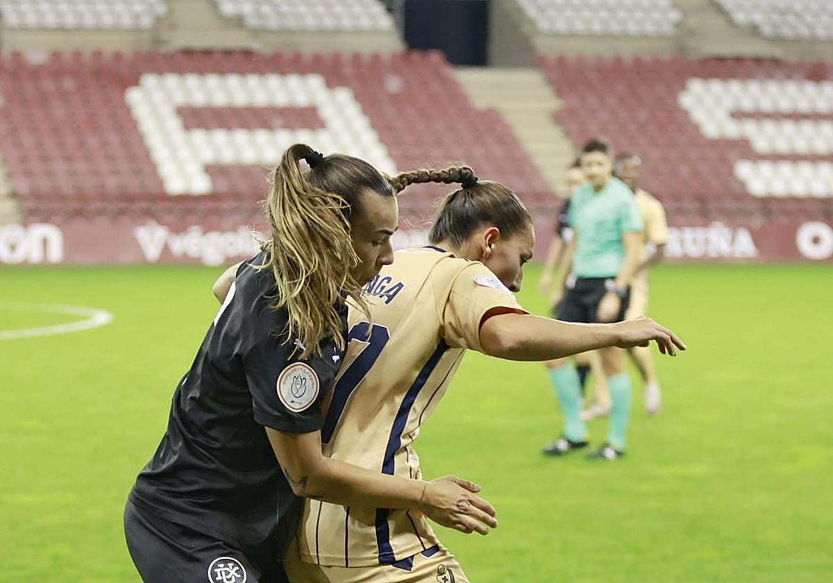 La debutante Malen Uranga pugna con una jugadora riojana.