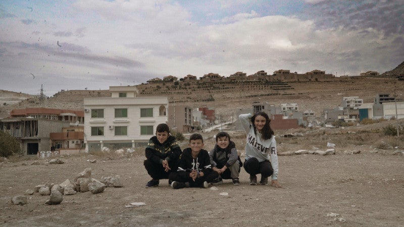 Imagen del reencuentro de Mediha con sus hermanos.