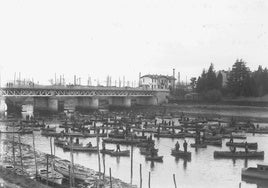 Multitud de pescadores en el río Bidasoa en la década de los 50.