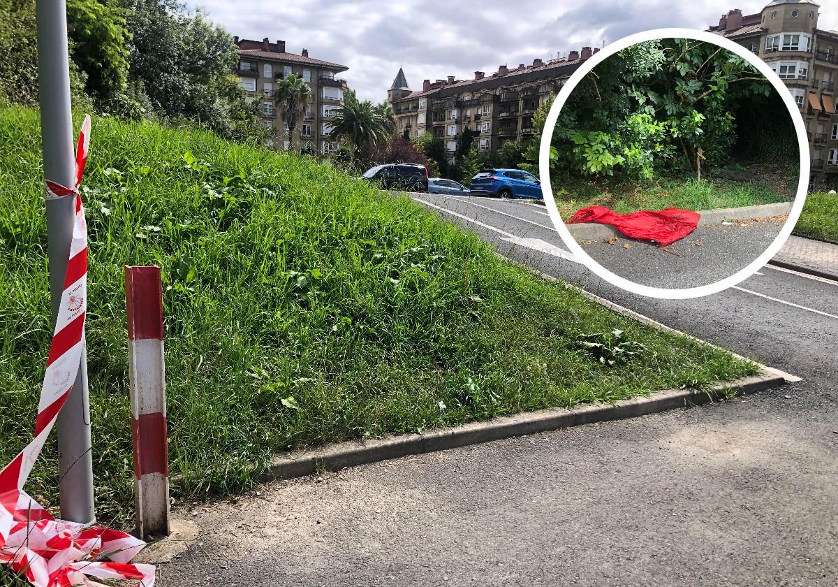 La Ertzaintza acordonó con una cinta blanca y roja el acceso al parking privado del paseo de Ondarreta donde sucedió la agresión, que aparece en la imagen con un marco blanco.