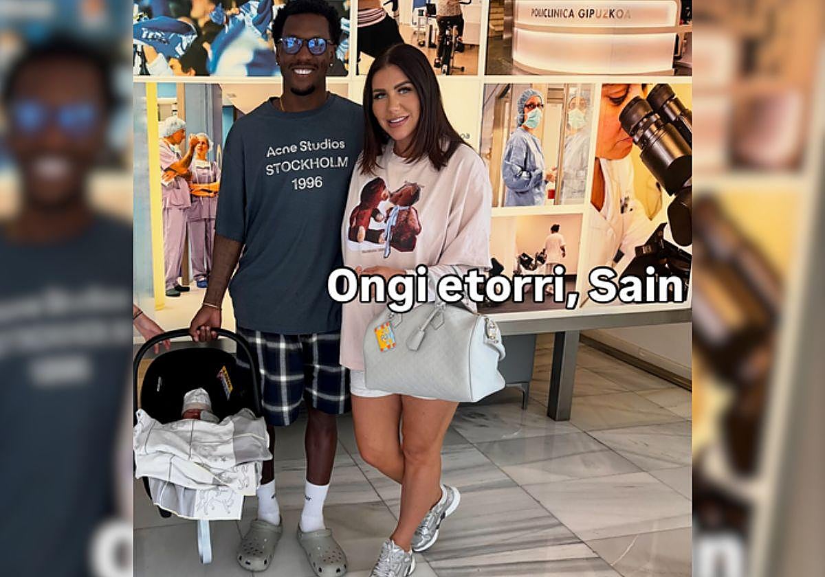 Sheraldo Becker con el pequeño Sain y su esposa, Kelly Loef.