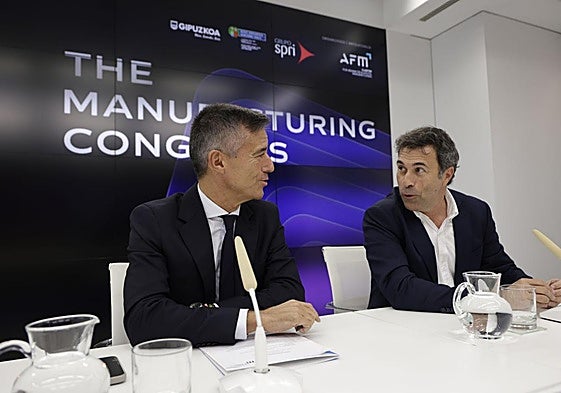 El director general de AFM Clúster, Xabier Ortueta, y el diputado foral de Promoción Económica, Unai Andueza.