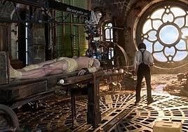 El doctor Frankenstein, en su laboratorio junto a su criatura