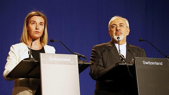 Federica Mogherini y Mohamad Javad Zarif. 