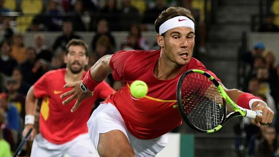 Rafa Nadal y Marc López. 