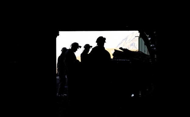 Mineros en la mina La Escondida en León. 