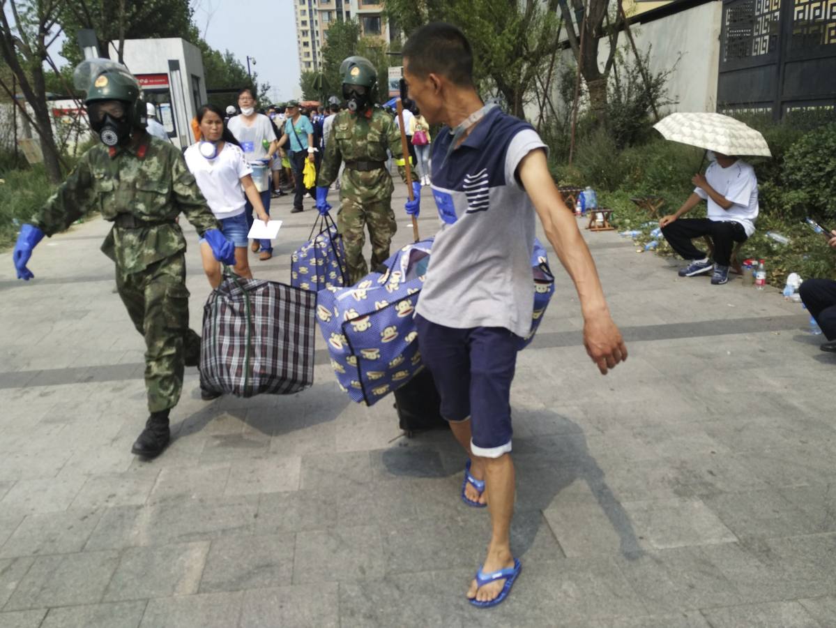 Dolor, rabia y desolación por Tianjin