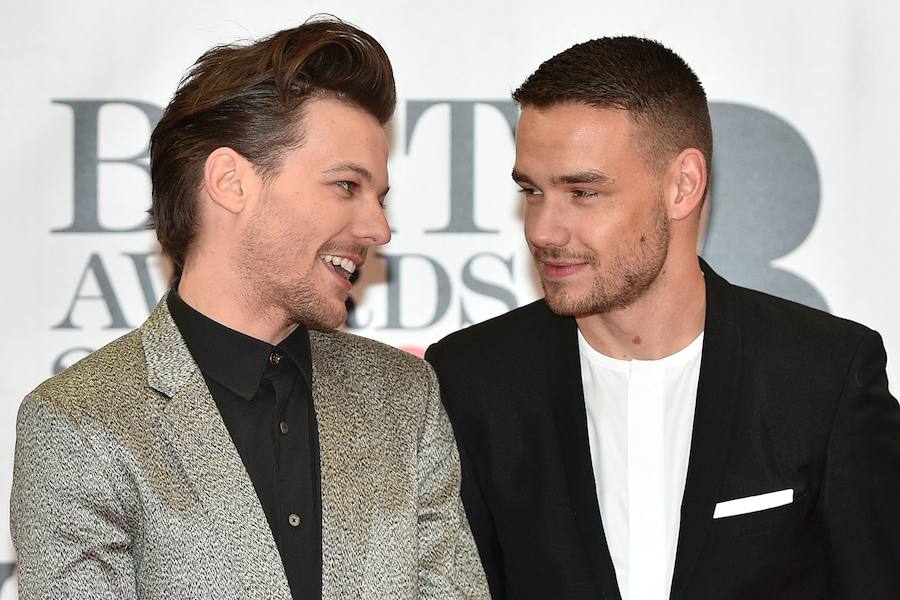 Louis Tomlinson (izq.) y Liam Payne, miembros de One Direction.