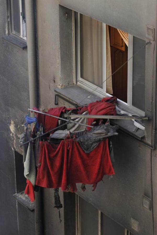 El día después del espectacular incendio que destruyó un bazar chino de Oviedo