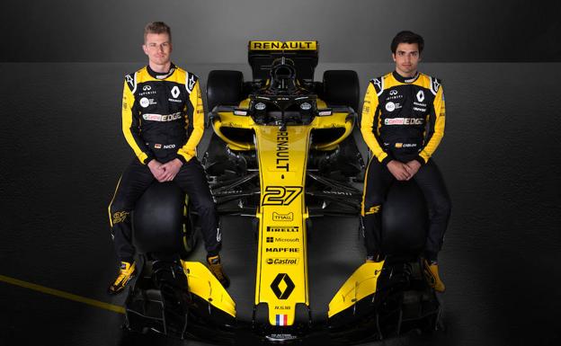 El nuevo monoplaza Renault, con los pilotos Carlos Sainz y Nico Hülkenberg. 