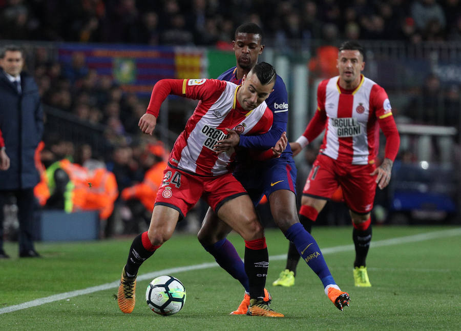 El conjunto de Valverde arrolla al Girona para afianzarse en el liderato. Tres goles de Suárez, un doblete de Messi y un gol de Coutinho neutralizaron el gol inicial de Portu.