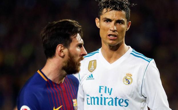 Messi y Cristiano, durante el último clásico. 
