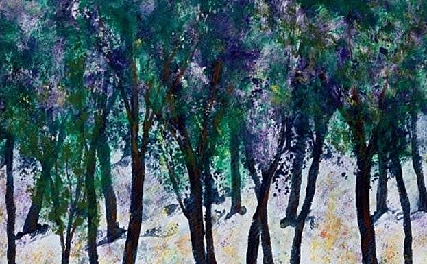 Los árboles centran el cartel de la Fidma. 