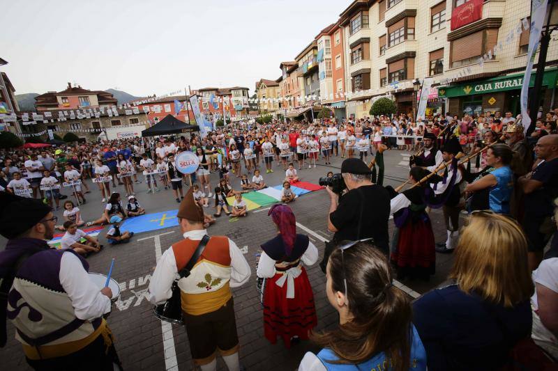 Ambas localidades tiñen sus calles de color para animar a vecinos y turistas a celebrar la gran fiesta de los concejos ribereños.