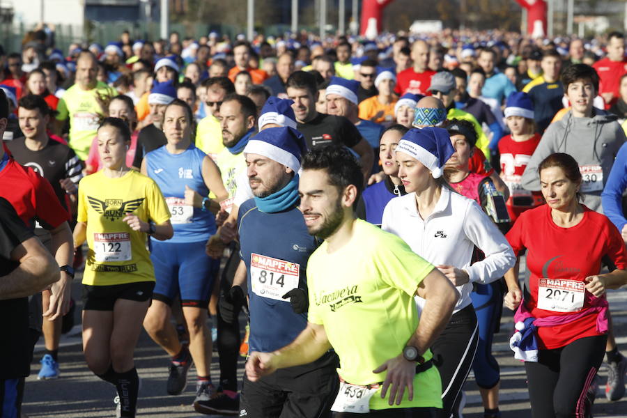 Fotos: ¿Estuviste en la Carrera Ppopular de Nochebuena? ¡Búscate!