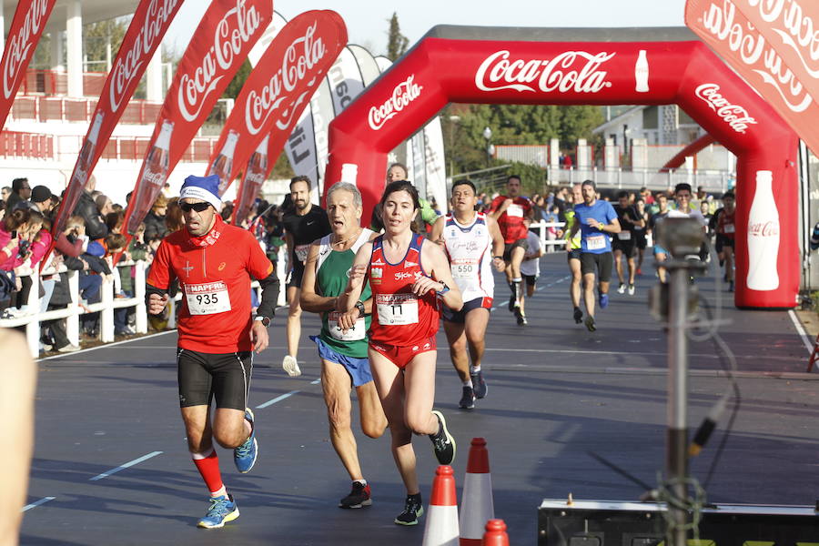 Fotos: ¿Estuviste en la Carrera Ppopular de Nochebuena? ¡Búscate!