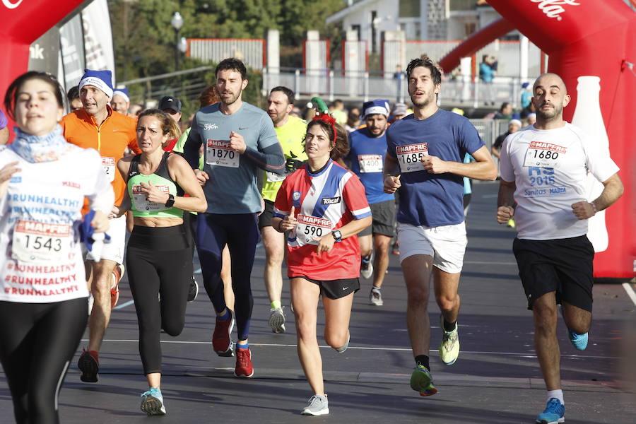 Fotos: ¿Estuviste en la Carrera Ppopular de Nochebuena? ¡Búscate!