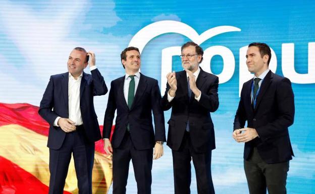 El expresidente del Gobierno, Mariano Rajoy, y el presidente del PP, Pablo Casado, y el secretario general, Teodoro García Egea, en la inauguración de la convención del partido.