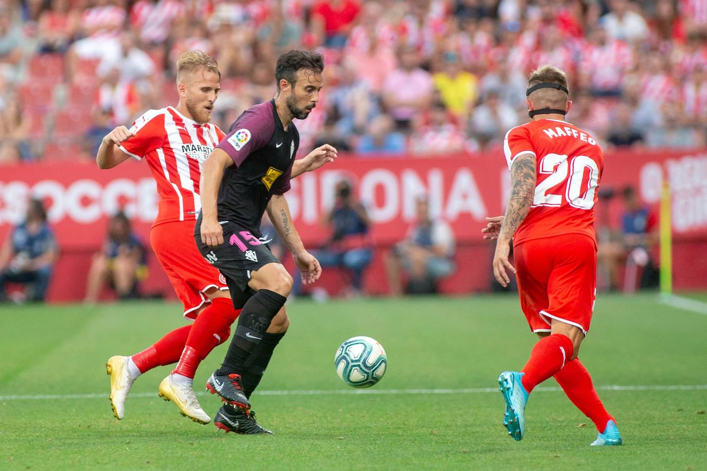 El Sporting consiguió un meritorio empate en Montilivi. Los rojiblancos jugaron gran parte de la segunda mitad con un futbolista menos por la expulsión de Damián. 