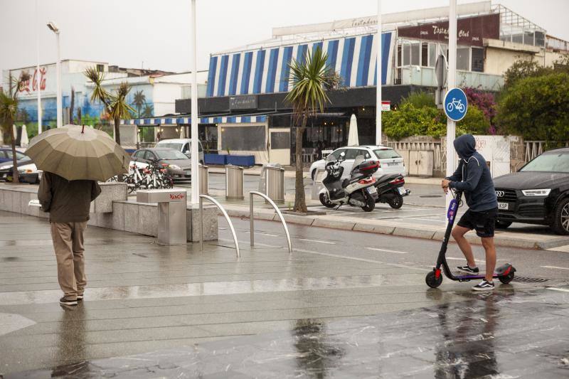 Fotos: Temperaturas otoñales y de intensas lluvias en Asturias