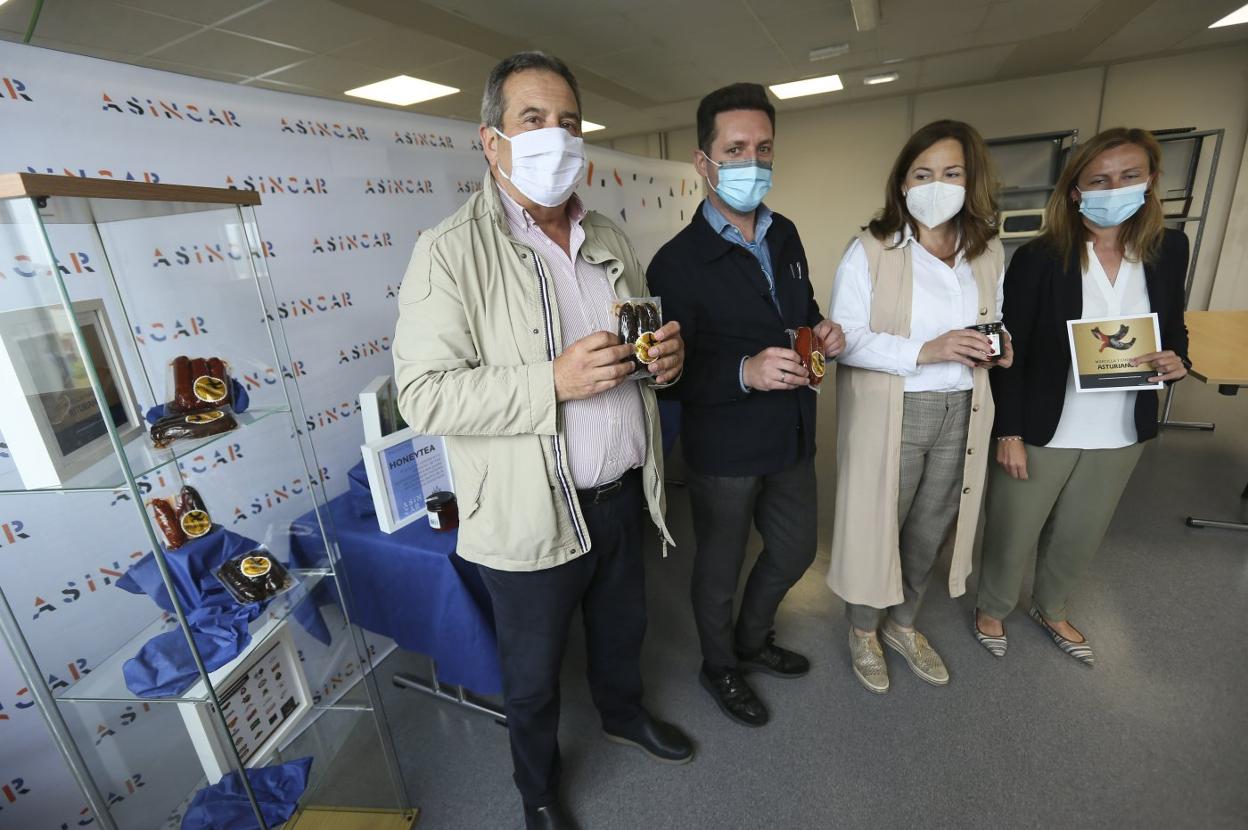 Vidal Álvarez, Antonio Palacio, Begoña López y Mayte Villastrigo, durante la jornada en Asincar. 