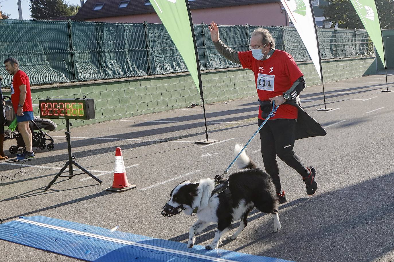 Fotos: Marcos Peón e Inés de Diego ganan la Carrera Solidaria Club de Regatas-Tenis